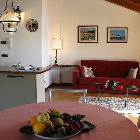 Alveluu Ristorante E Suites Tremezzo Habitación foto