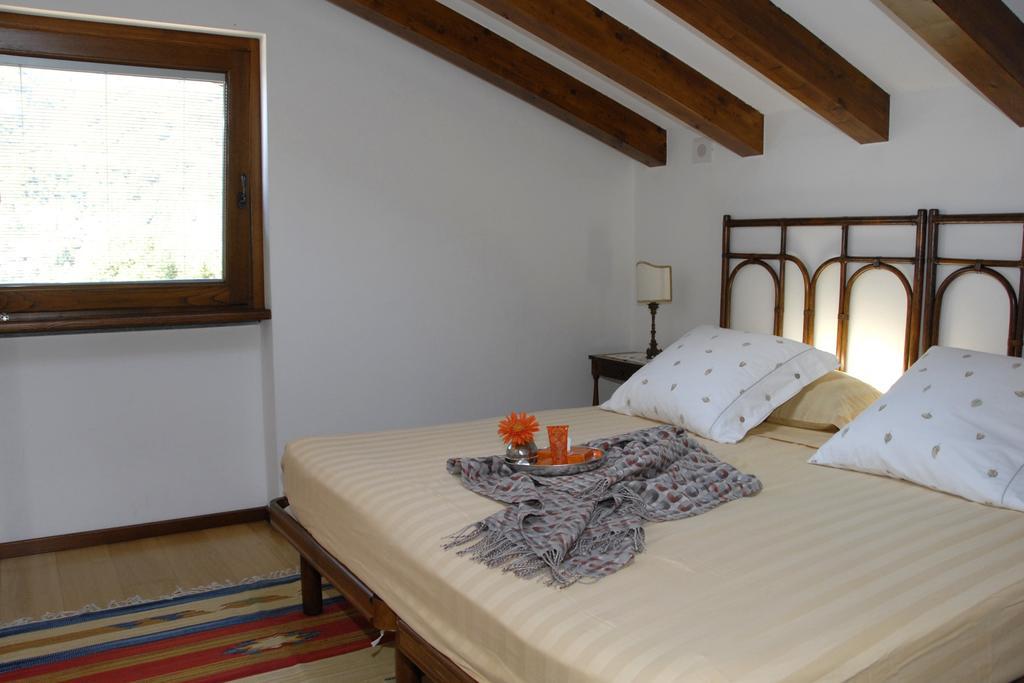 Alveluu Ristorante E Suites Tremezzo Habitación foto
