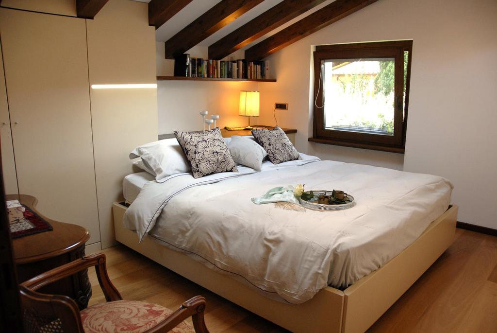 Alveluu Ristorante E Suites Tremezzo Habitación foto