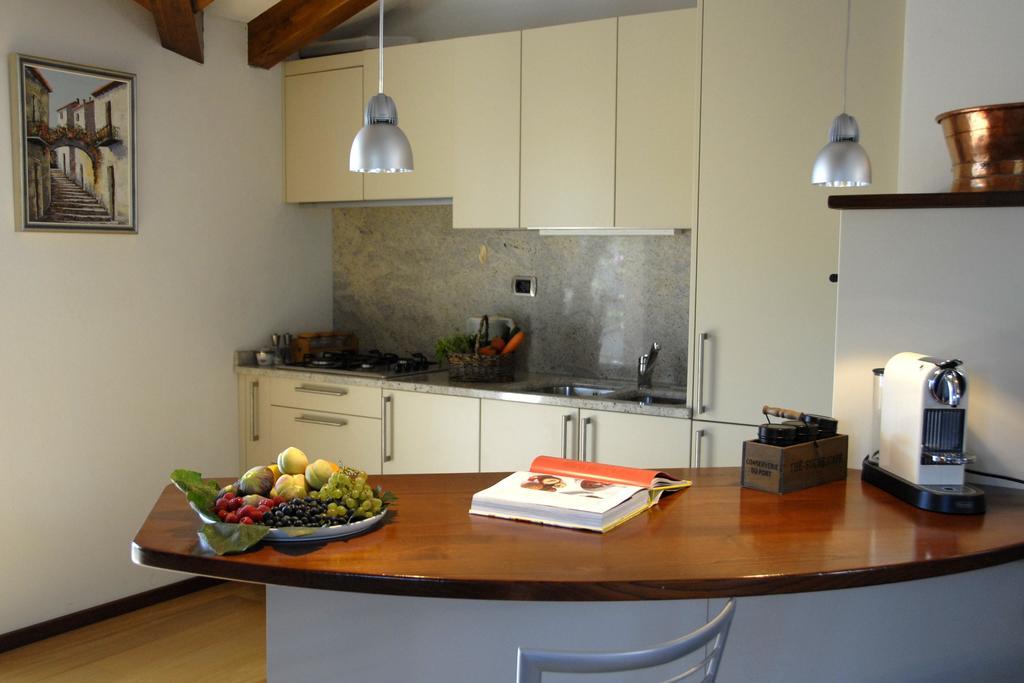 Alveluu Ristorante E Suites Tremezzo Habitación foto